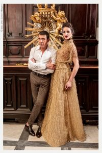Nella foto lo stilista Michele Miglionico e una modella